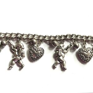 Silvertone Angel Charm Bracelet with Cherub angels and Heart Pendants